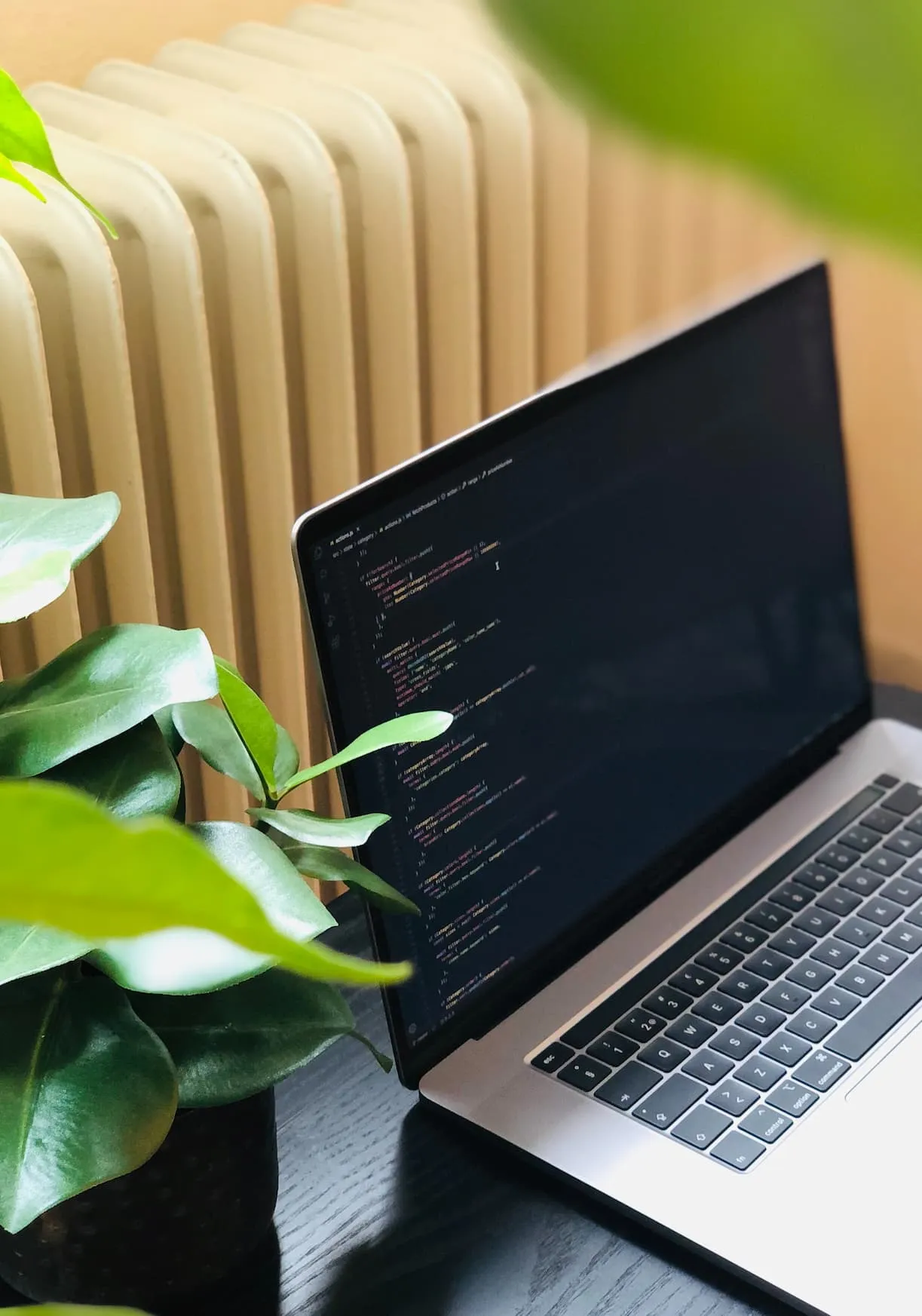 Laptop with code on the screen